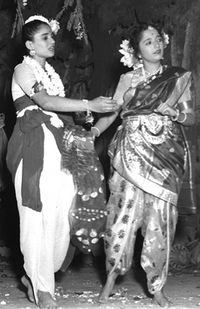 Two Indian women in a scene from a play about Shakuntala
