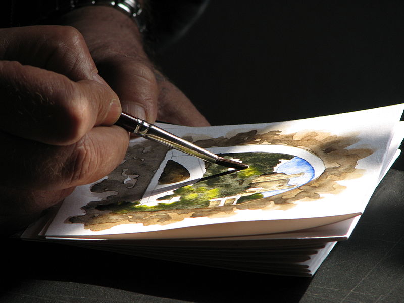 Fichier:Dolceacqua43 - Artista locale mentre dipinge un acquarello.jpg