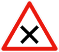 Intersection de deux voies. Priorité aux véhicules venant de la droite