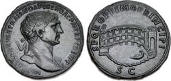 Monnaie de Trajan. Avers : portrait de Trajan. Revers : une arche du pont de Trajan sur le Danube : tablier de charpente sur piles de maçonnerie.